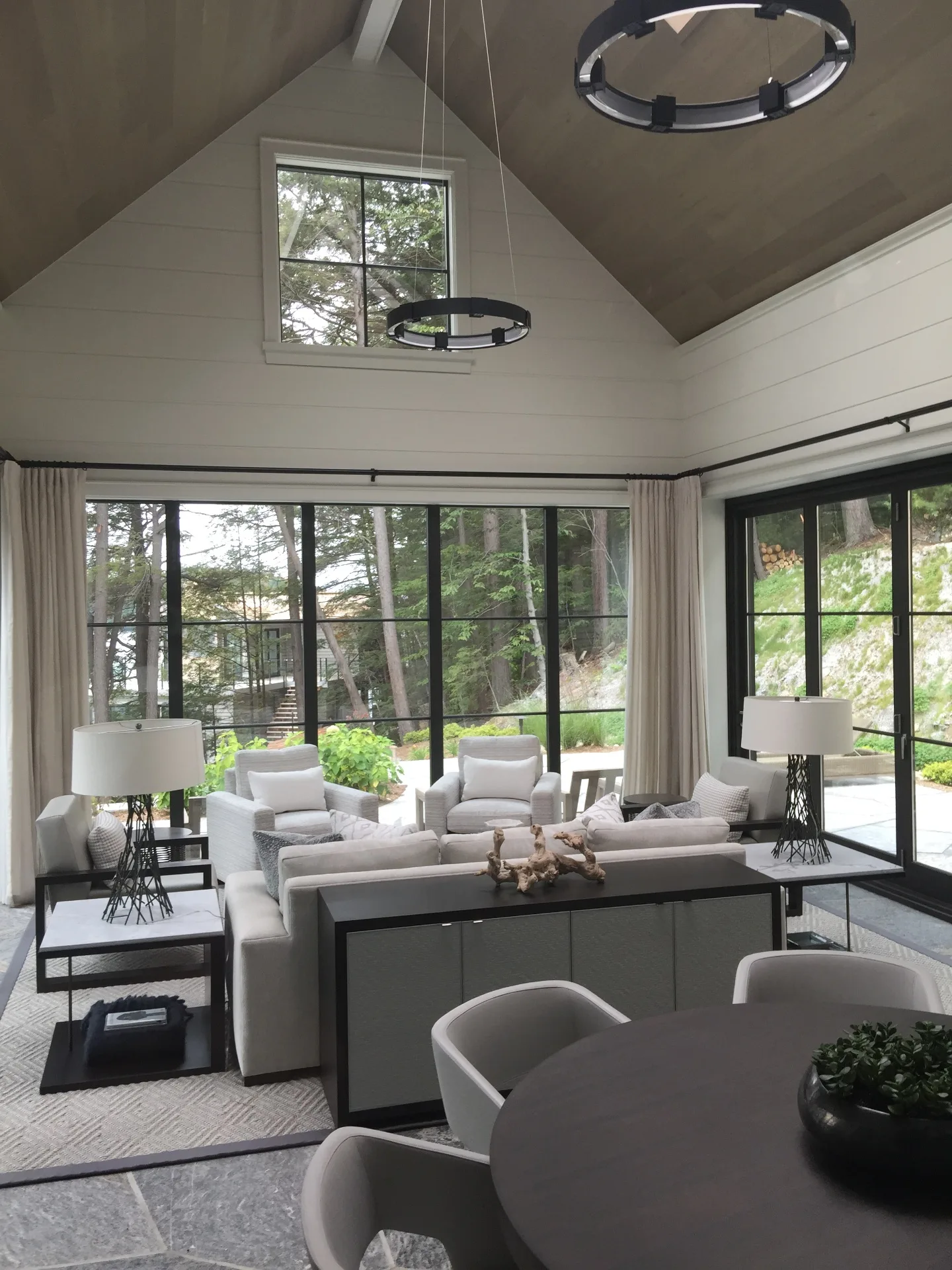 Modern cottage great room interior painting by Roll On Painting — Port Carling, Muskoka